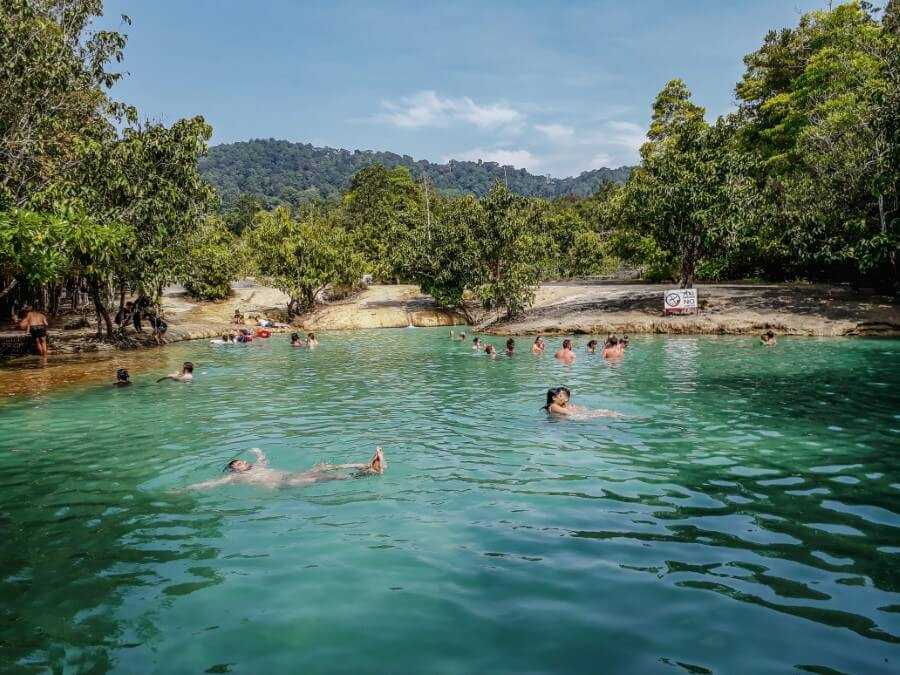 people swimming in an emerald pool in Krabi