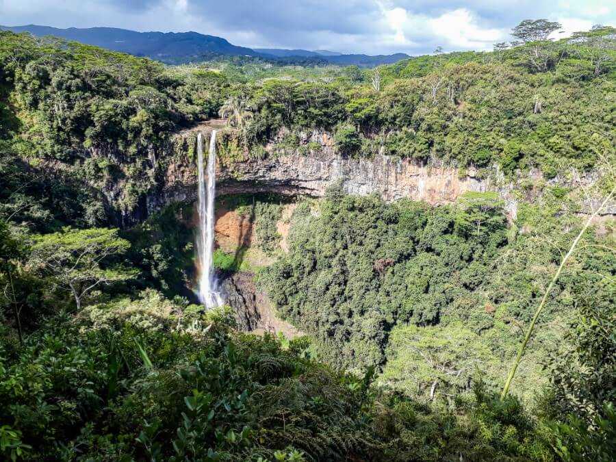 Twin waterfall surrounded by lush vegetation at Chamarel in summer - best Mauritius weather 