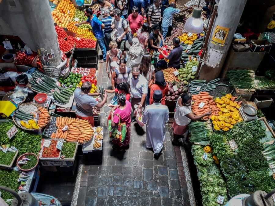 people walking around the central Market in Port Louis Mauritius