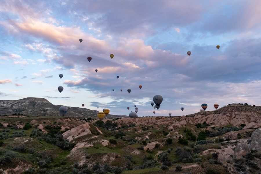 view of hot air balloons during sunrise