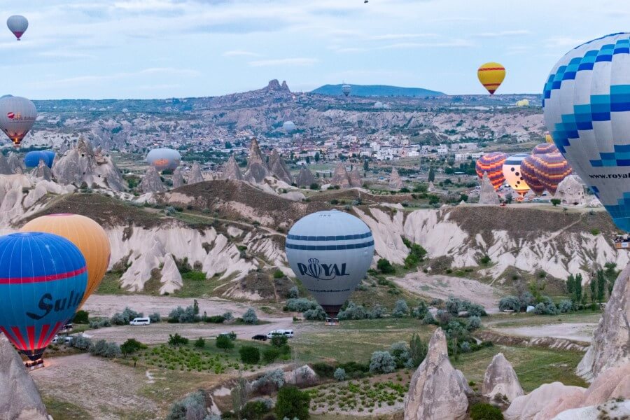 early sunrise view of the Cappadocia hot air balloons in Turkey