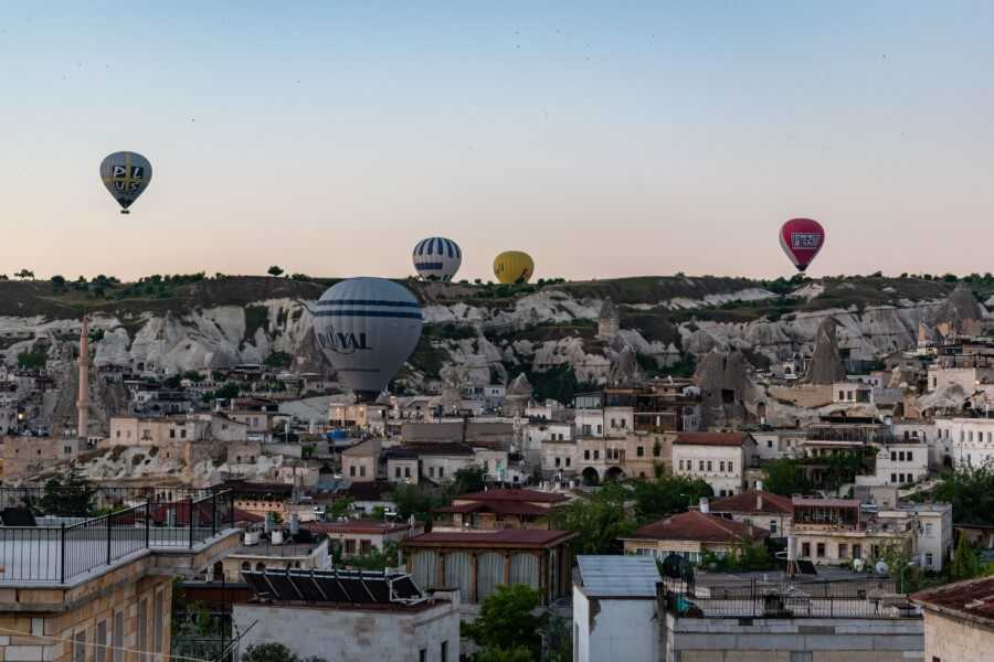 View of the hot air balloons from a hotel in Goreme Cappadocia