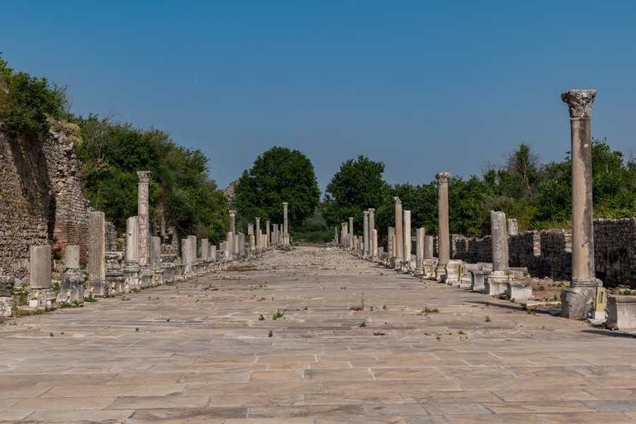 marble colums along a road at the harbor of ephesus turkey
