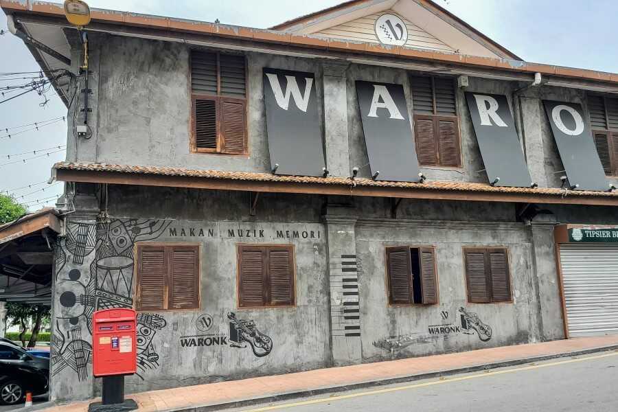 black and white street art of musical instruments at makan muzik memori melaka