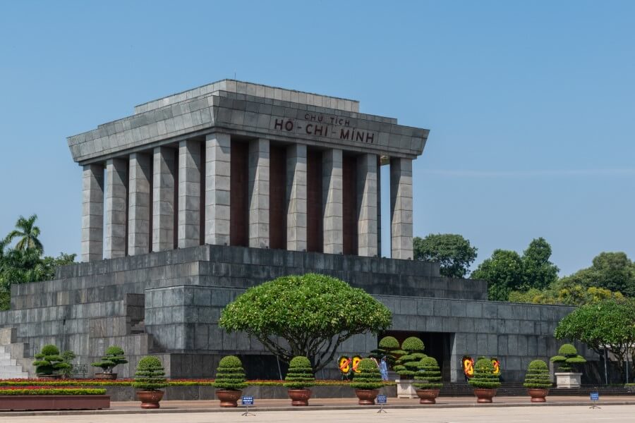 a grey building with multiple columns housing the remains of Ho Chi Minh hanoi north vietnam